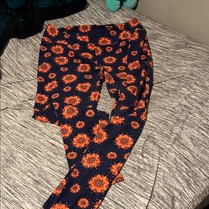 LuLaRoe Navy Leggings with Orange and Pale Pink Medallions